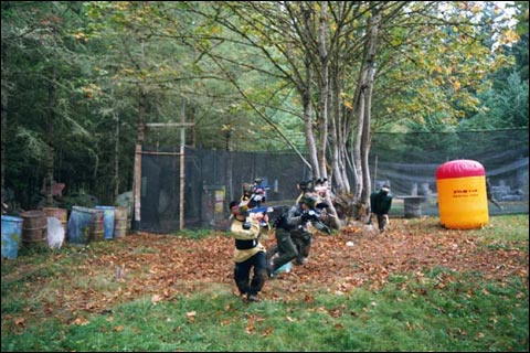 Paintball Team starts game at Splat Action Paintball Field in Moalla, Oregon.